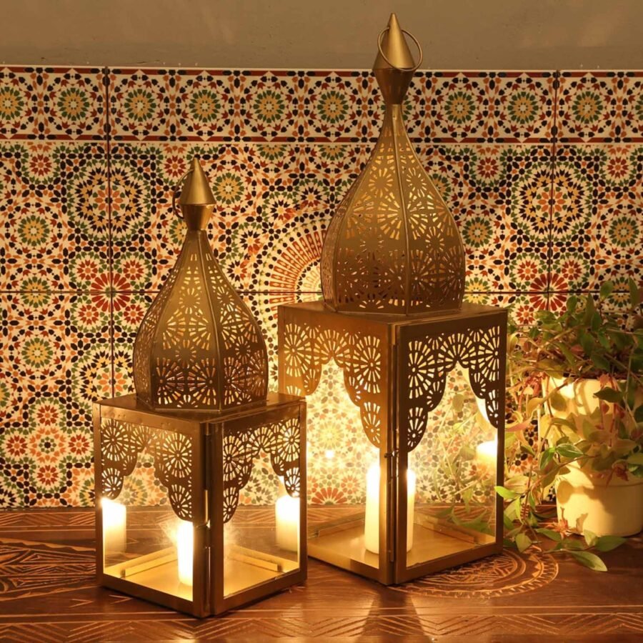 Enchanting hanging candle lanterns with intricate designs, perfect for home and garden decor.