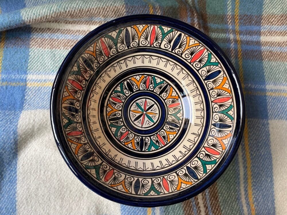 Handmade pottery bowl with Tamegroute glaze, ideal for Moroccan decor or serving.