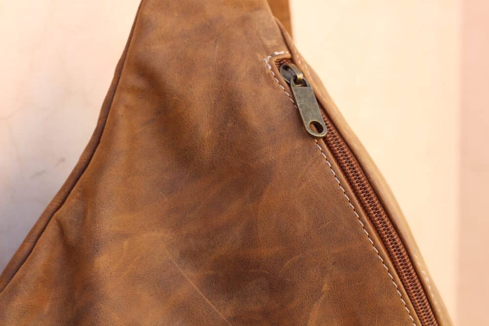 Interior view of Leather Sling Bag showing spacious compartments.