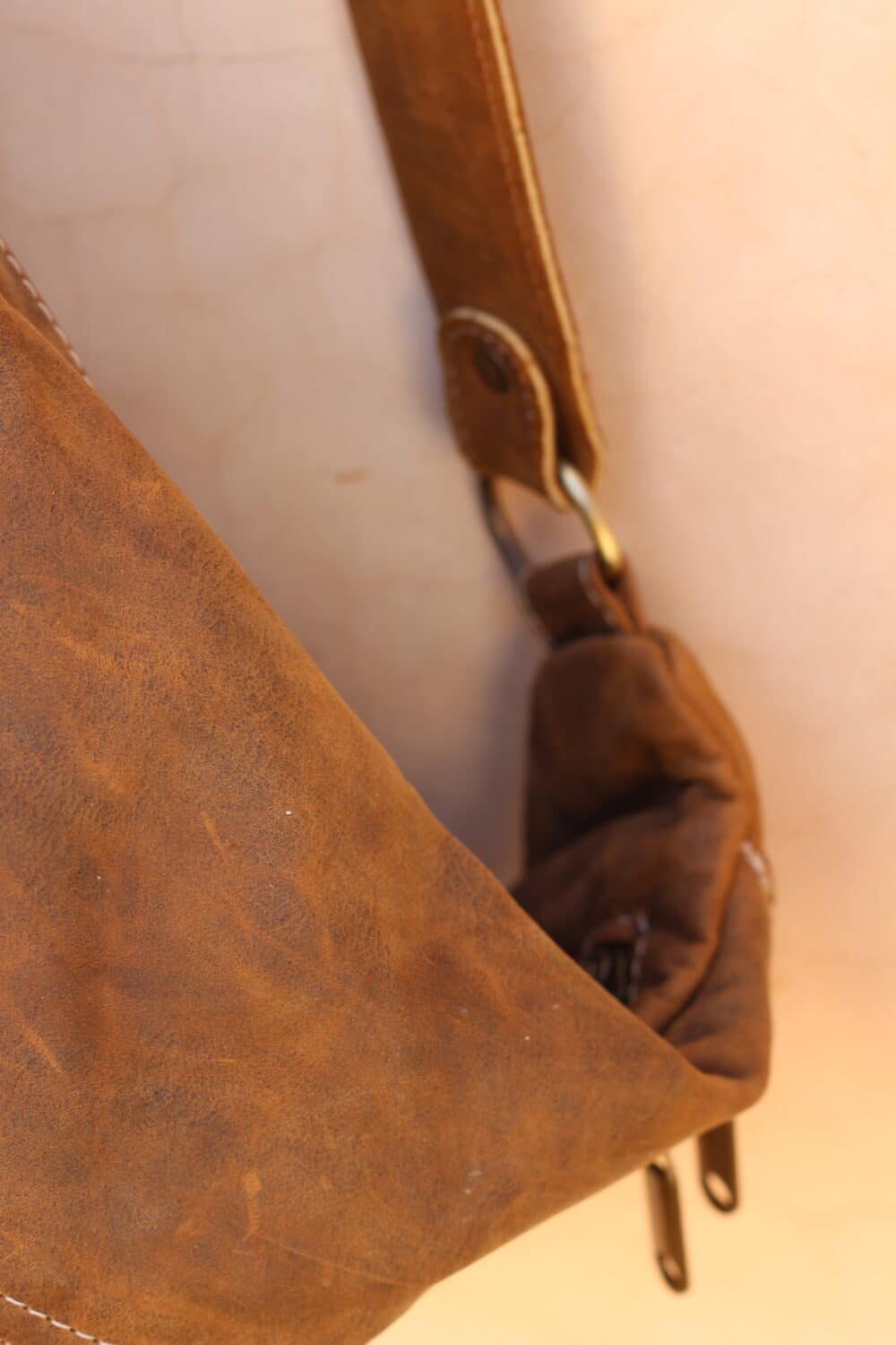 Unisex Leather Sling Bag with modern compact design and premium materials.