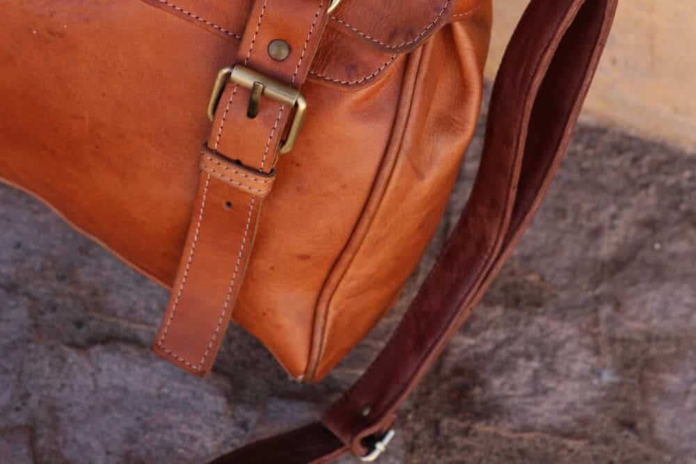 Unisex Leather Shoulder Bag with a sleek and minimalist design.