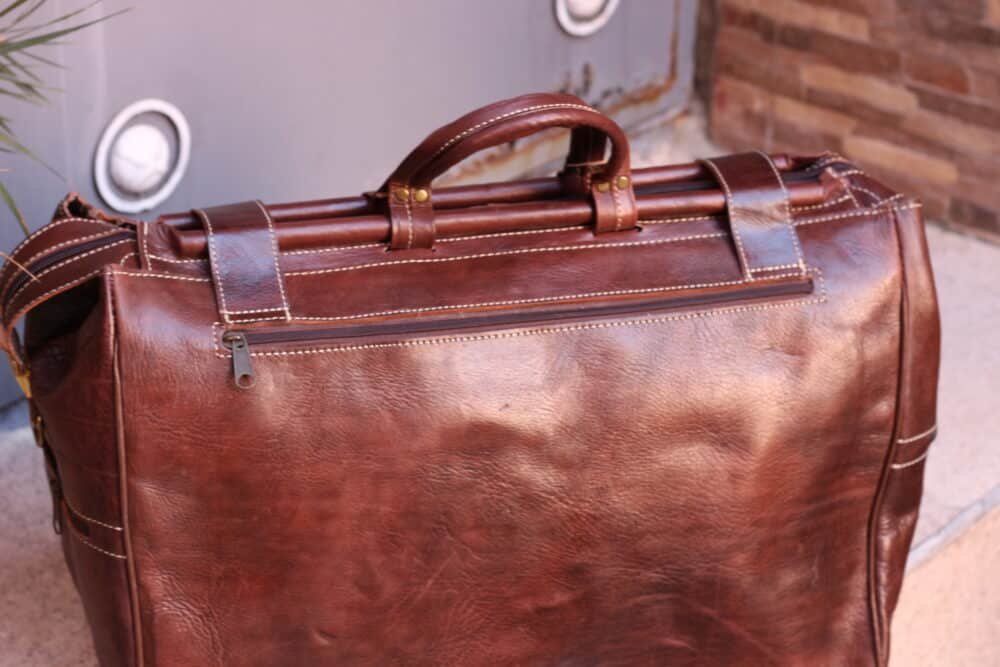 Elegant Large Leather Bag resting on a table, showcasing its sleek design