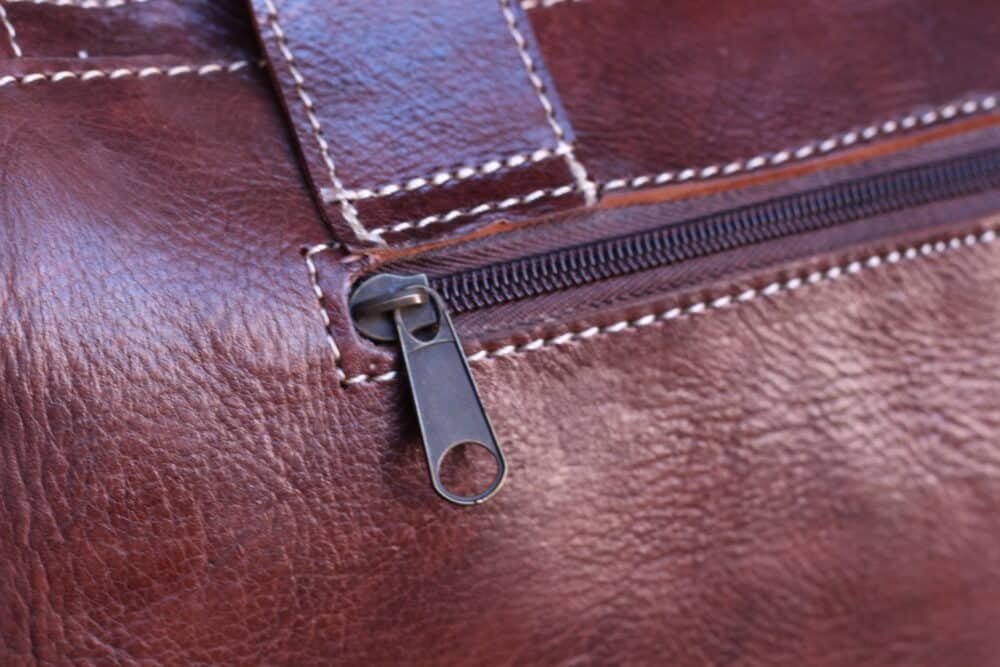 Model carrying an Elegant Large Leather Bag, showing its versatility