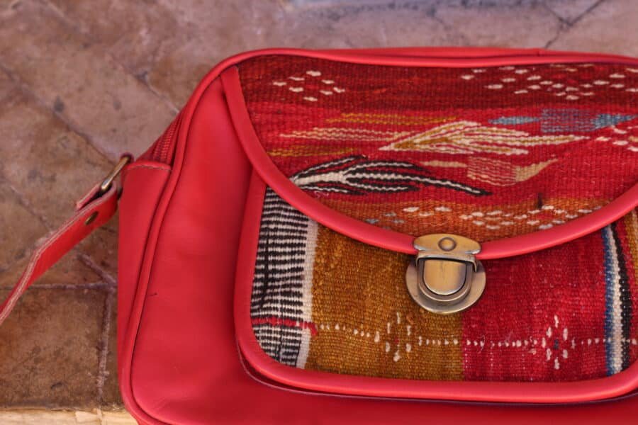 Cross Over Leather Bag with red leather and warm Moroccan kilim patterns