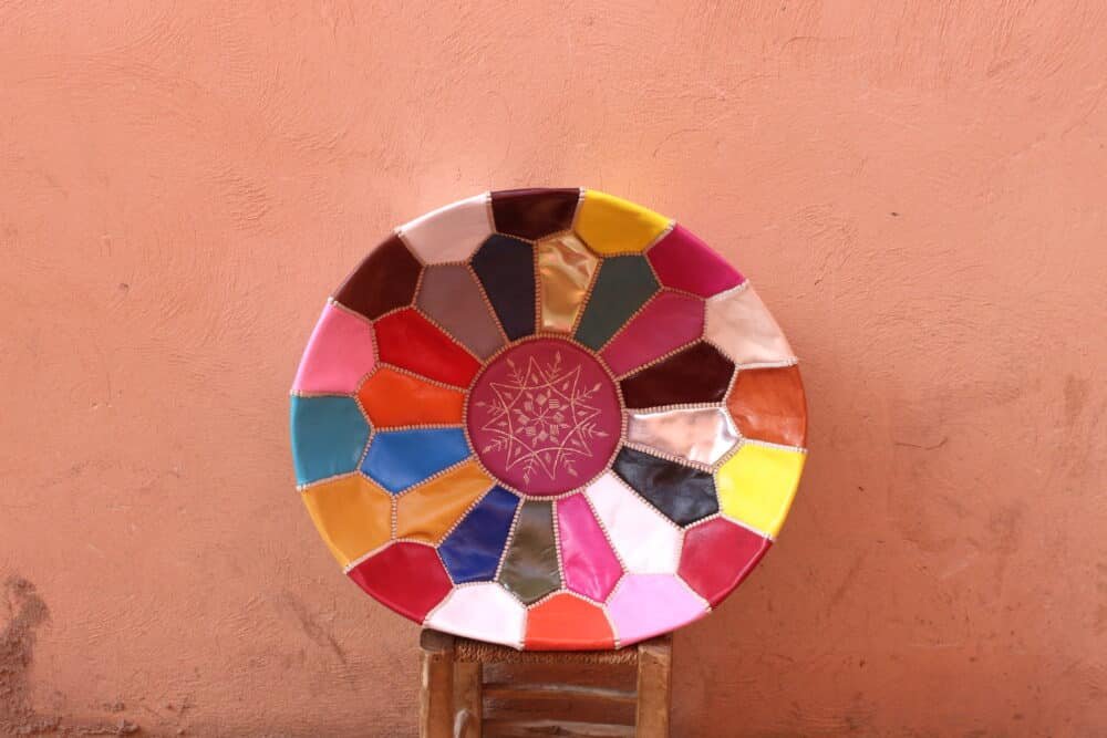 Multicolor Moroccan Leather Pouf handcrafted with vibrant patchwork design for home decor.