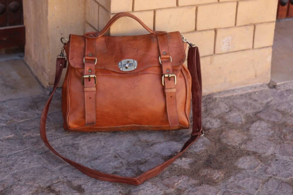 Leather Shoulder Bag with secure zippered compartments.