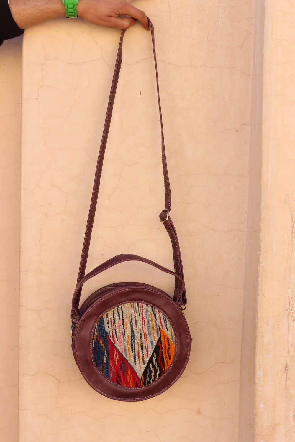 Fabulous small leather crossbody bag in tan with a gold zipper closur