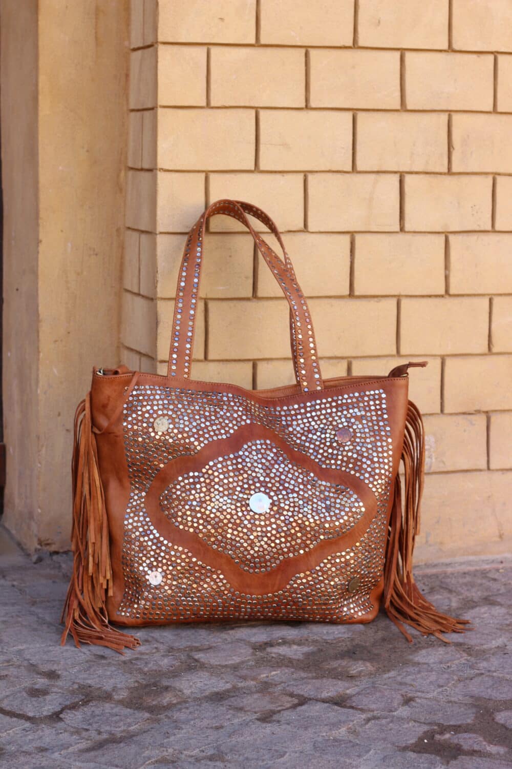 Premium leather cross the body bag with zipper closure and adjustable strap