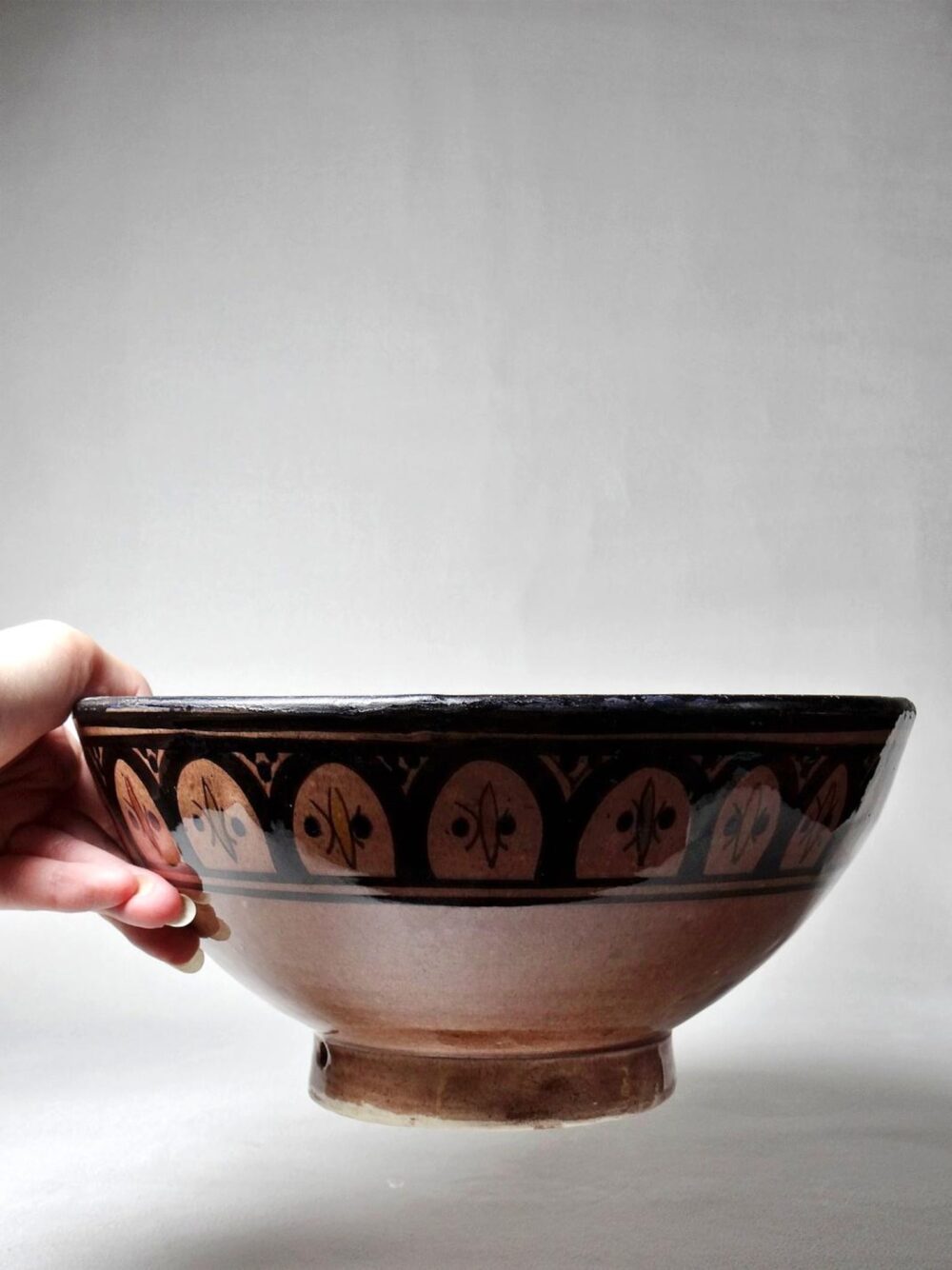High-quality brown ceramic bowl on table
