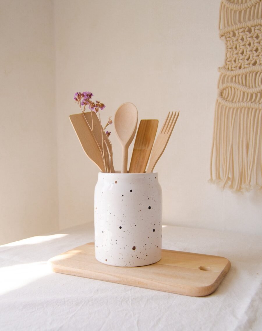 Authentic ceramic utensil holder on a kitchen counter