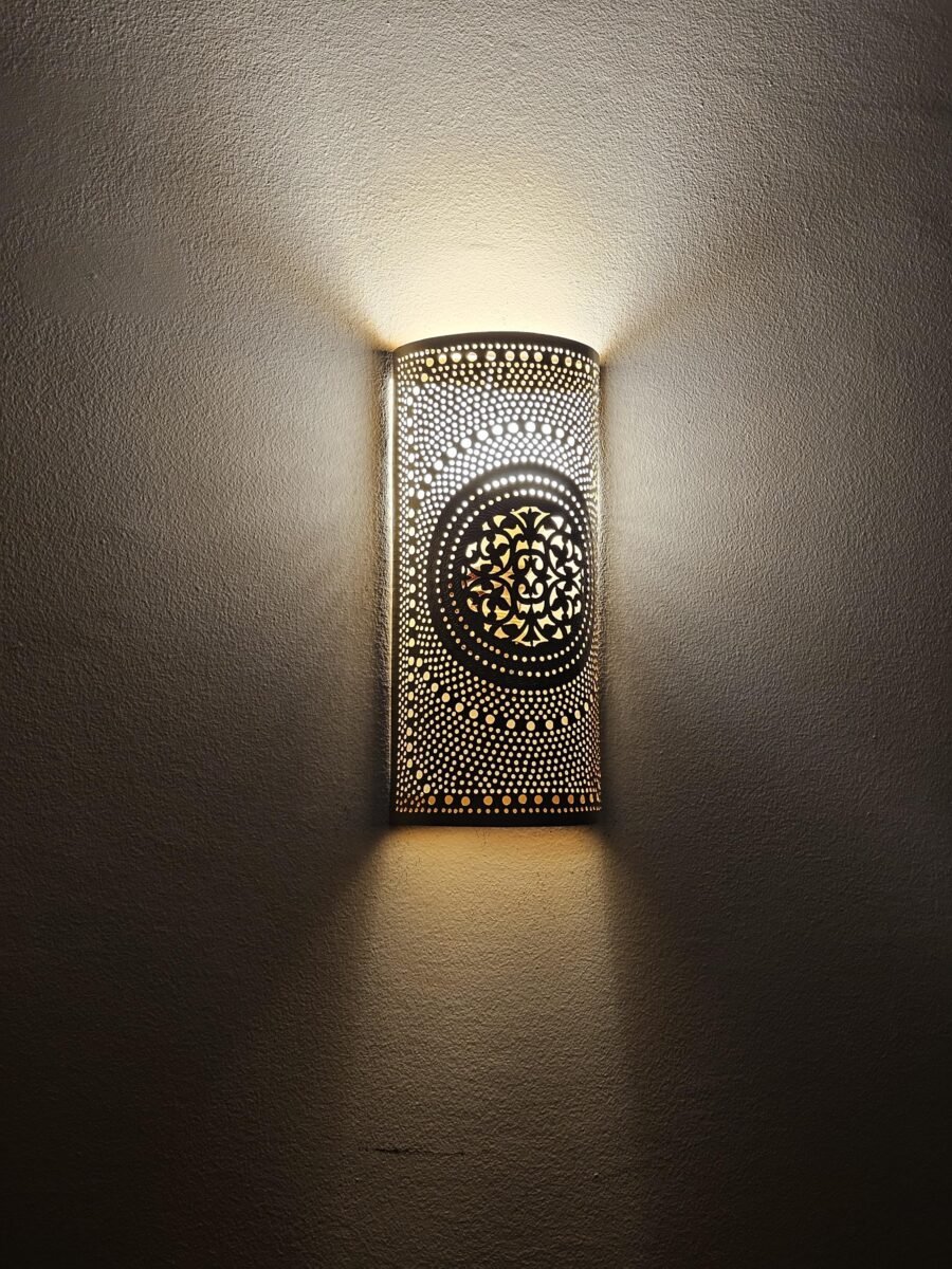 Elegant radiant wall light illuminating a hallway