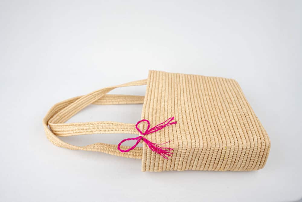 Close-up of the Brilliant Raffia Beach Bag showing its intricate raffia detailing