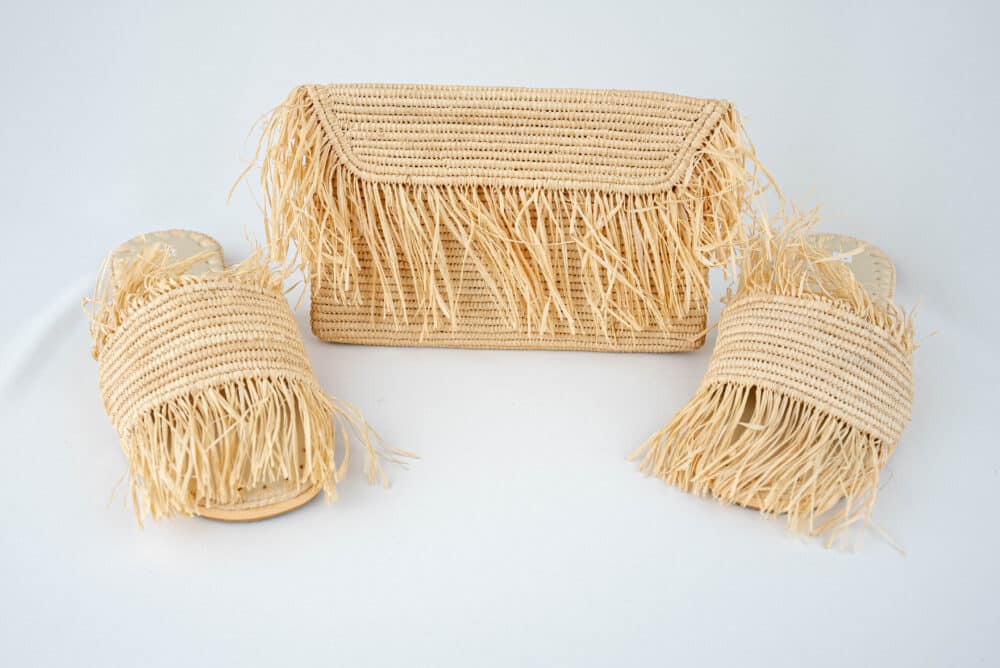 Authentic Handmade Raffia Pouch Clutch Bag paired with a summer dress for a chic look