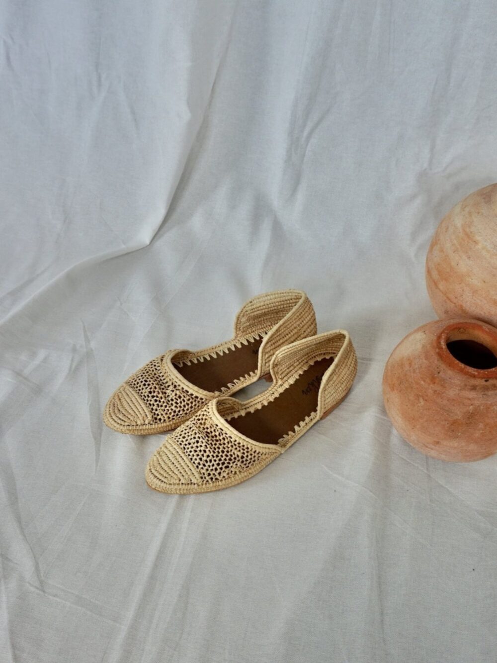 Stylish Raffia Slippers paired with casual summer attire